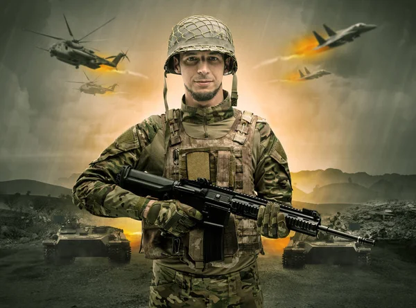 Armed soldier standing in the middle of a war — Stock Photo, Image