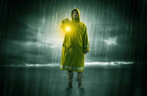 Man walking in storm with lantern