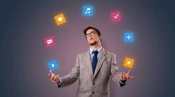 Person juggle with application icons — Stock Photo, Image