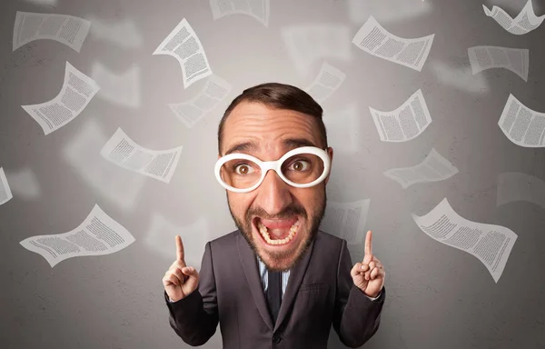 Big head on small body with flying documents — Stock Photo, Image