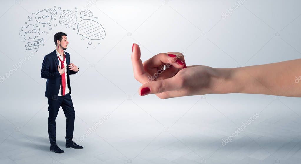 Kissed businessman with baiting hand concept