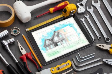 Tablet ve araçları ev planı kavramı ile