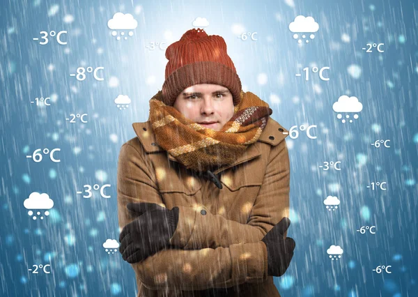 Boy freezing in warm clothing with weather condition concept — Stock Photo, Image