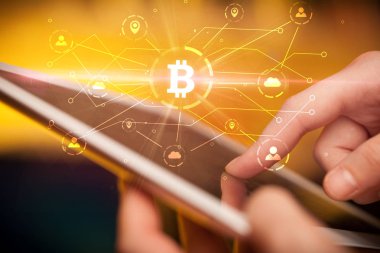 El bitcoin bağlantı ağı ve online kavramı ile tablet kullanma