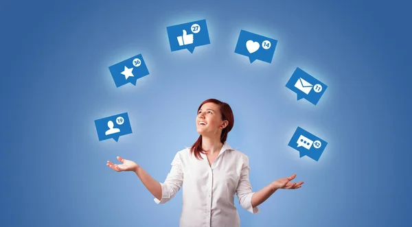 Person juggle with social media symbols