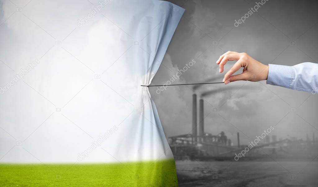 hand pulling nature cityscape curtain to gray cityscape