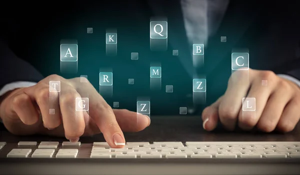 Mujer escribiendo en el teclado con letras alrededor —  Fotos de Stock