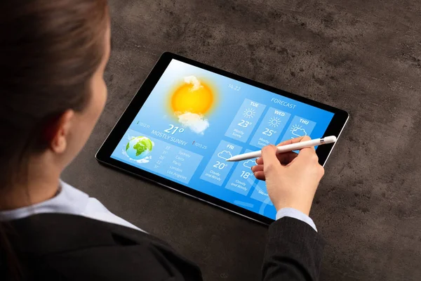 Business woman checking weather — Stock Photo, Image