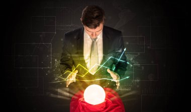 İşadamı borsa sihirli bir top ile geleceği tahmin