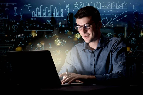 Businessman in the office at night — Stock Photo, Image