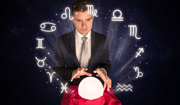 Astronaut looking for inspiration in his crystal magic ball