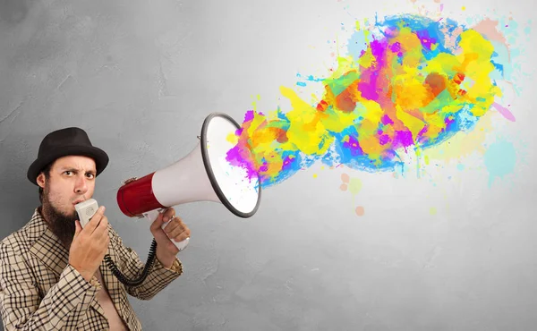 Paint splash with person and megaphone — Stock Photo, Image