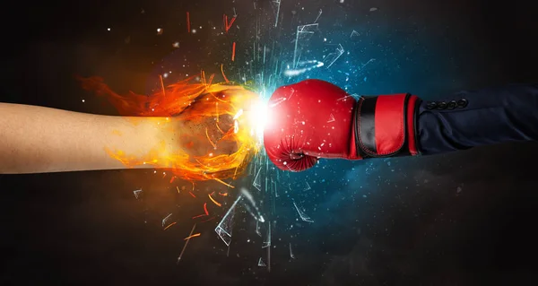 Fighting hands breaking glass with fire and water — Stock Photo, Image