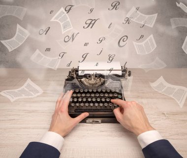 Belge çevresinde uçan ile el typewriting