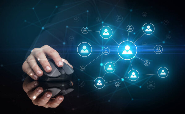 Hand using mouse with human networking concept