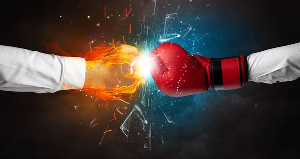 Fighting hands breaking glass with fire and water — Stock Photo, Image