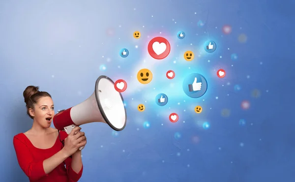 Person speaking in loudspeaker with social media concept — Stock Photo, Image