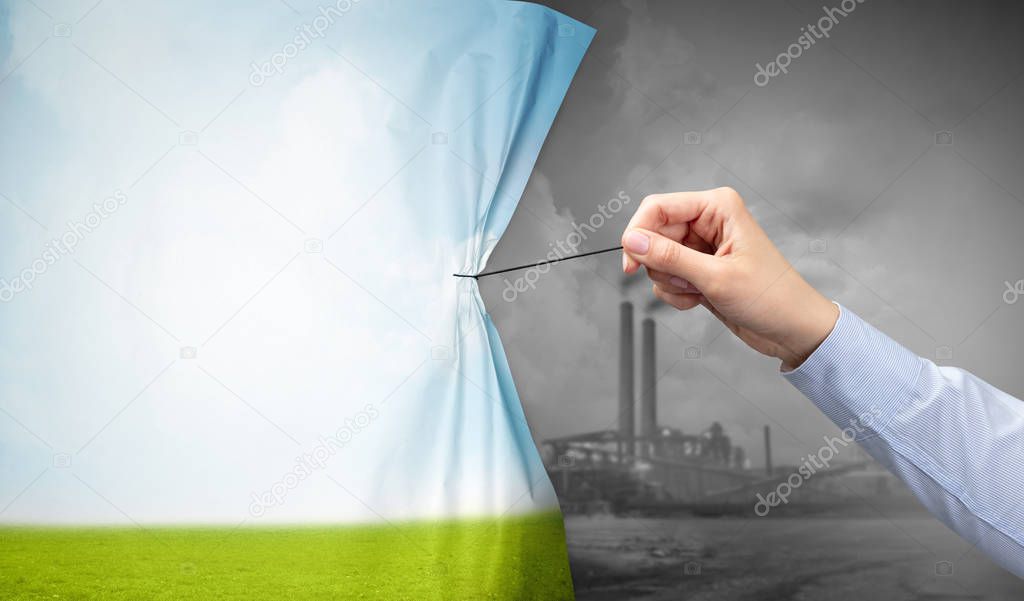 hand pulling nature cityscape curtain to gray cityscape