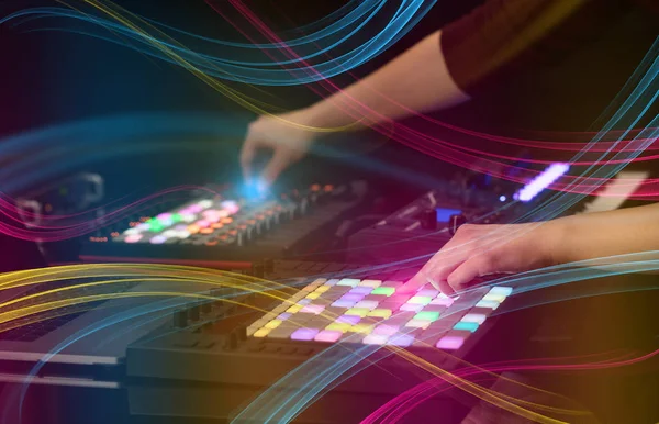 Mixing music on midi controller with colorful vibe concept — Stock Photo, Image