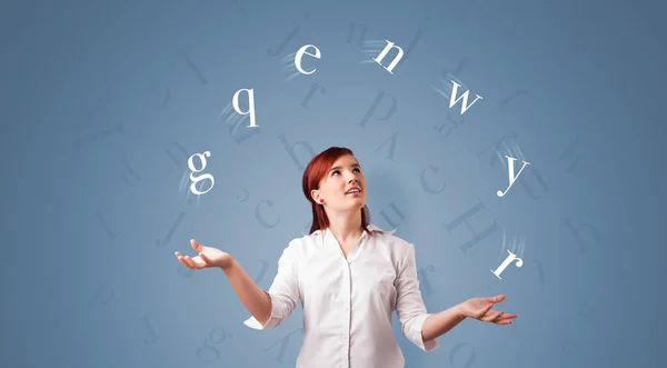 Person juggle with letters — Stock Photo, Image