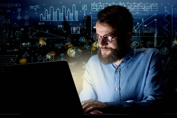 Businessman in the office at night — Stock Photo, Image