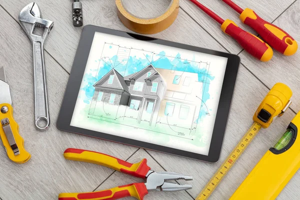 Tablet and tools with house plan concept — Stock Photo, Image