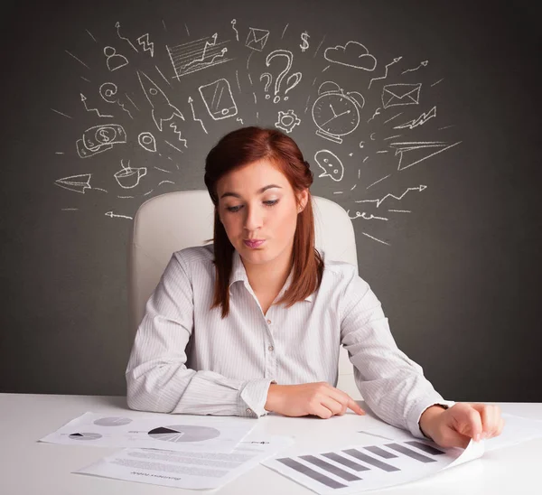 Manager in front of the office desk with direction concept Stock Photo