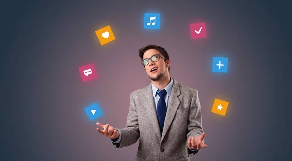 Person juggle with application icons — Stock Photo, Image