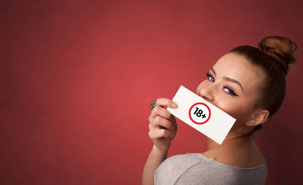 Person holding 18 card in her hand — Stock Photo, Image