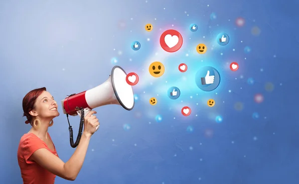 Person speaking in loudspeaker with social media concept — Stock Photo, Image