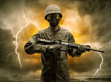 Silahlı asker anlaşılması güç bir havada duran