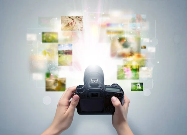 Hand captures life events with digital camera — Stock Photo, Image