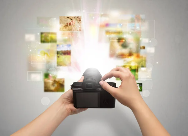 Hand hält Lebensereignisse mit Digitalkamera fest — Stockfoto