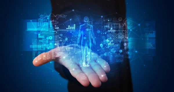 Young person holding hologram projection with health concept — Stock Photo, Image
