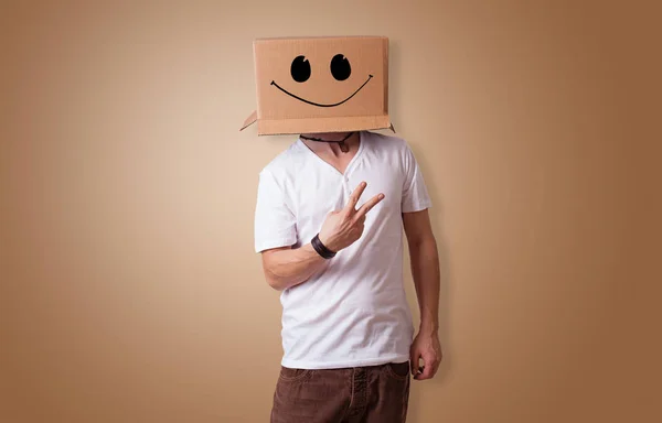 Man with cardboard head — Stock Image Man with cardboard head Stock Photo