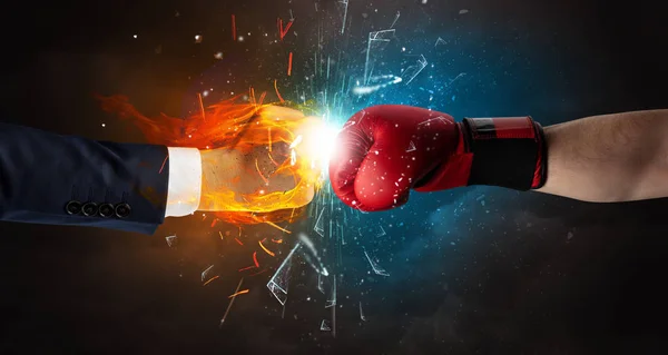 Fighting hands breaking glass with fire and water — Stock Photo, Image