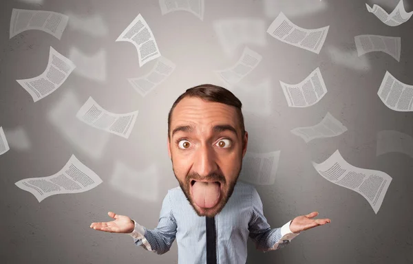 Big head on small body with flying documents — Stock Photo, Image