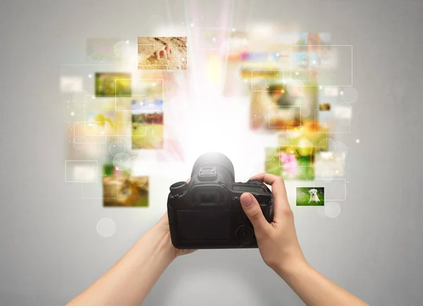 Hand captures life events with digital camera — Stock Photo, Image