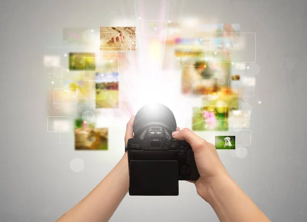 Hand vangt gebeurtenissen in het leven met digitale camera — Stockfoto