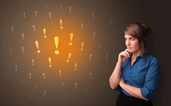 Person standing with exclamation sign concept — Stock Photo, Image