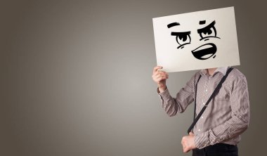 Bir kağıt doodle ifade yüzünün önünde tutan kişi