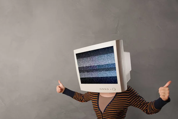 Young person with monitor on head — Stock Photo, Image