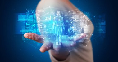Hologram Projeksiyon sağlık konsepti ile tutan genç kişi