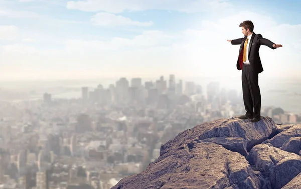 Business person looking to the city from distance — Stock Photo, Image