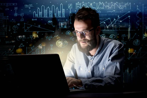 Businessman in the office at night — Stock Photo, Image