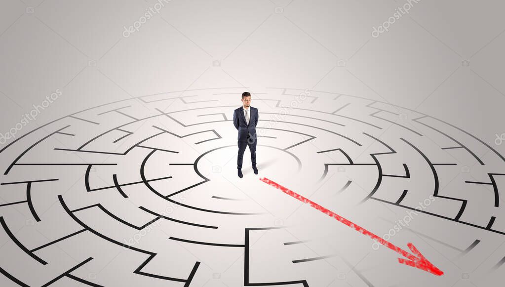 Businessman going through the maze