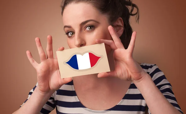 Person holding French flag card — Stock Photo, Image