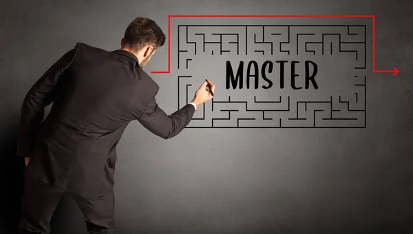 Businessman drawing maze — Stock Photo, Image