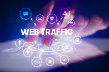 Web teknolojisi simgeleriyle tablete dokunmak