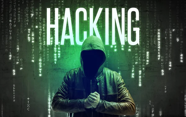 Faceless hacker with inscription — Stock Photo, Image